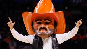 Oklahoma State mascot Pistol Pete gestures in the first half of an NCAA men's basketball game against Alabama in Oklahoma City, Saturday, Dec. 18, 2010. (AP Photo/Alonzo Adams)