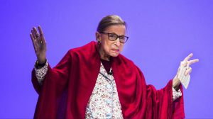 Supreme Court Justice Ruth Bader Ginsburg walks on the stage to join Amherst College President Biddy Martin for a conversation in Coolidge Cage at Amherst College on October 3, 2019. (Photo by Erin Clark for The Boston Globe via Getty Images)