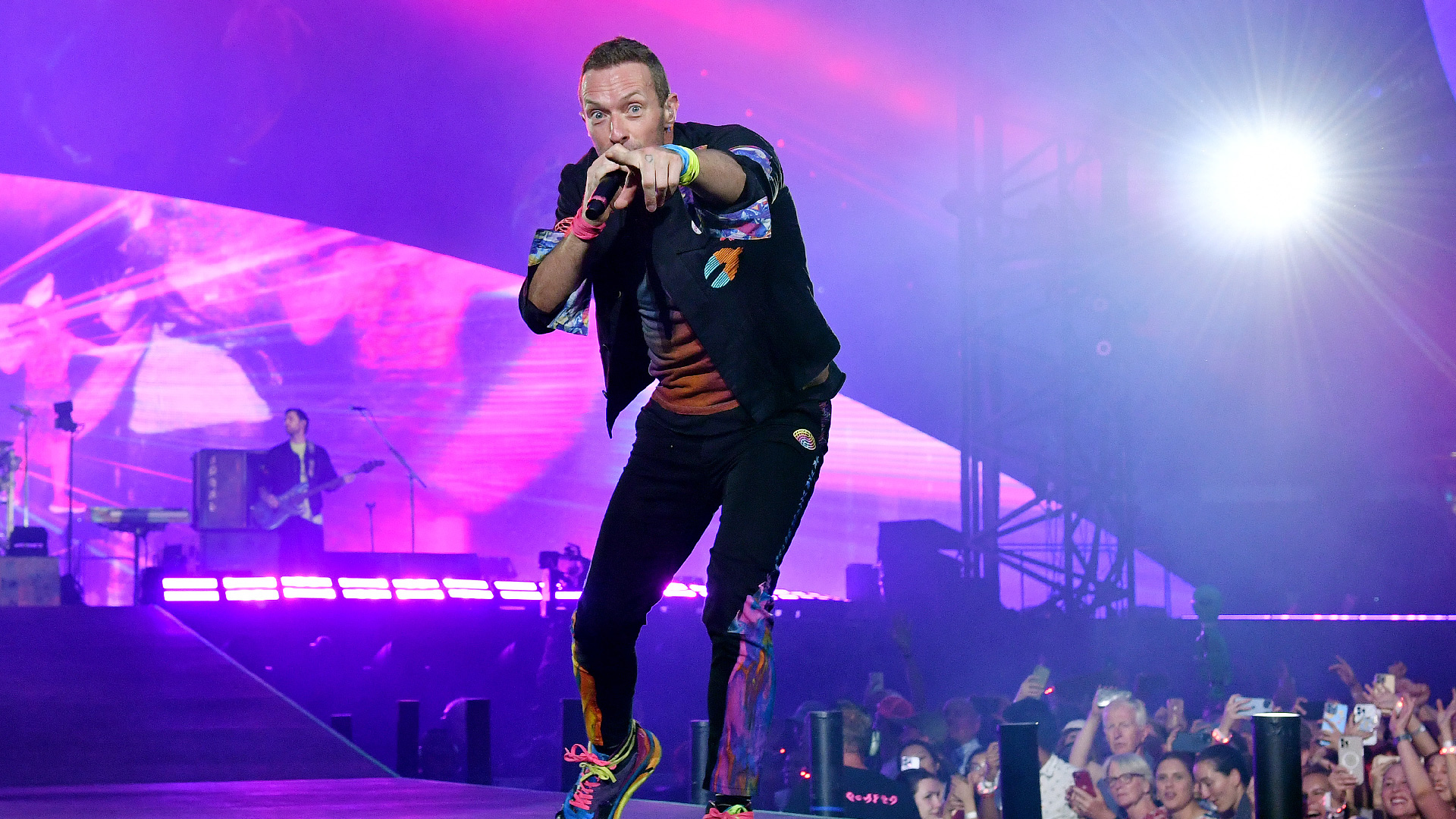 Chris Martin of Coldplay performs on stage at Wembley Stadium during the 'Music of the Spheres' World Tour on August 12, 2022 in London, England.