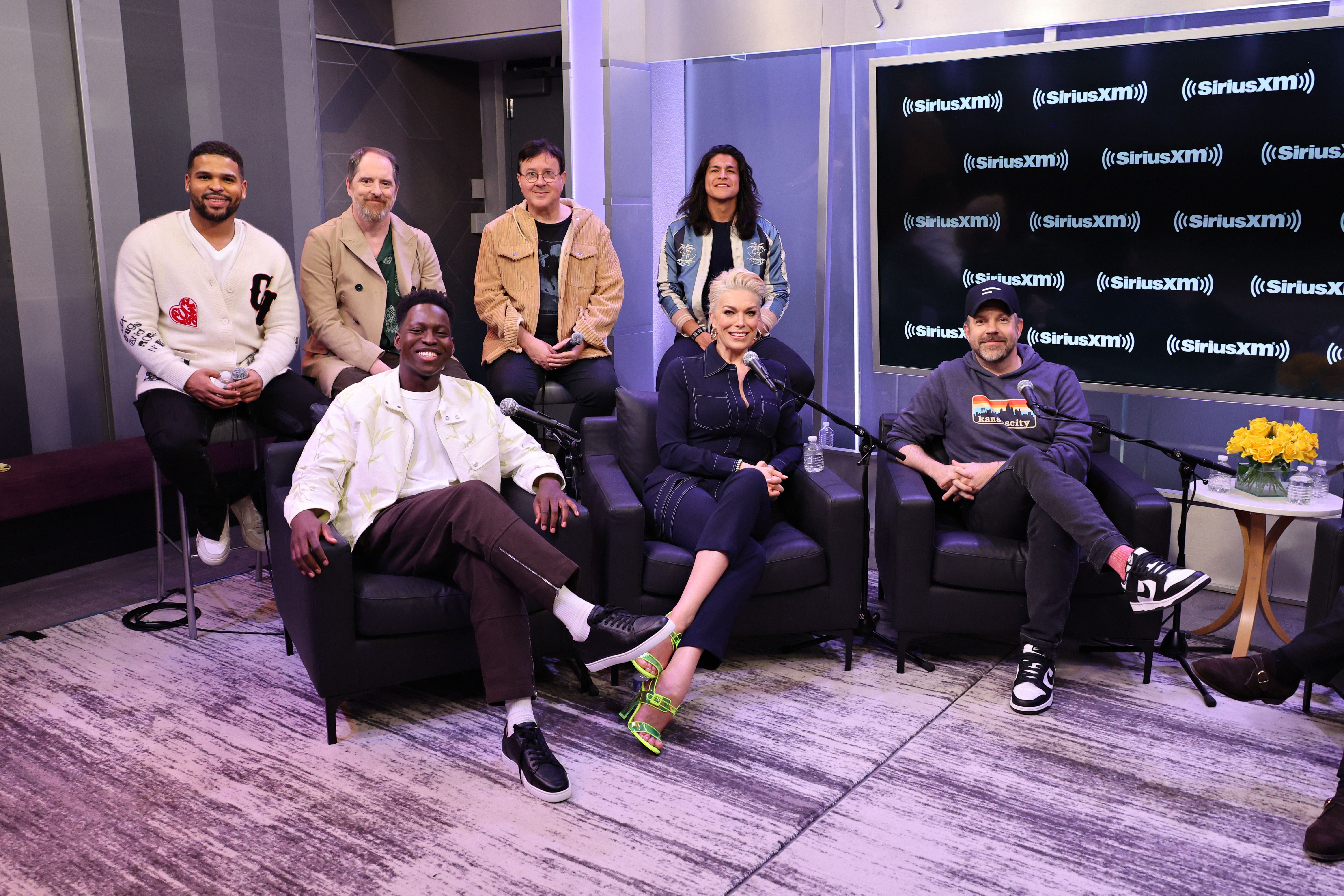 NEW YORK, NEW YORK - MARCH 16: (Back row L-R) Kola Bokinni, Brendan Hunt, Jeremy Swift, Cristo Fernández, (front row L-R) Toheeb Jimoh, Hannah Waddingham and Jason Sudeikis take part in SiriusXM's Town Hall with the Cast of 'Ted Lasso' at the SiriusXM Studios on March 16, 2023 in New York City