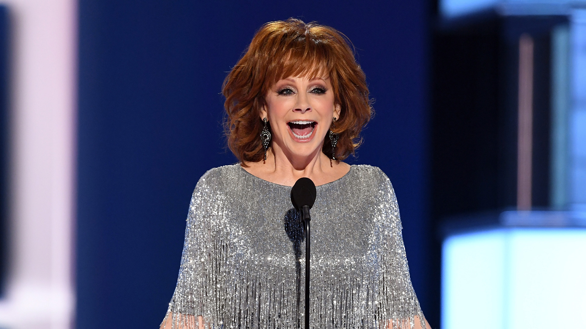 Host Reba McEntire speaks onstage during the 54th Academy Of Country Music Awards at MGM Grand Garden Arena on April 07, 2019 in Las Vegas, Nevada.