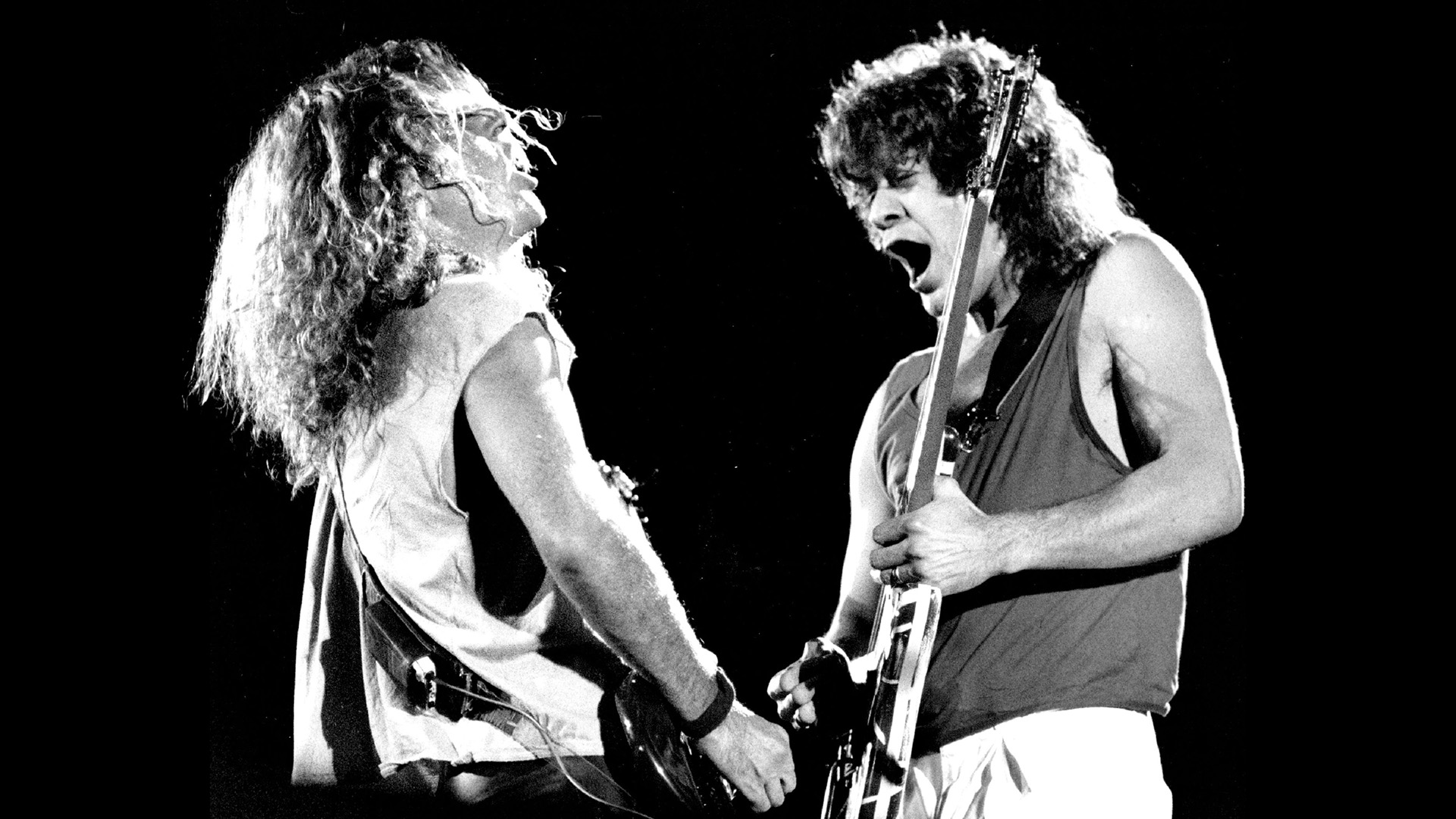 JUL 31 1988; Sammy Hagar left and Eddie Van Halen jam on the guitars 5; during the closing nite of Monsters Of Rock.