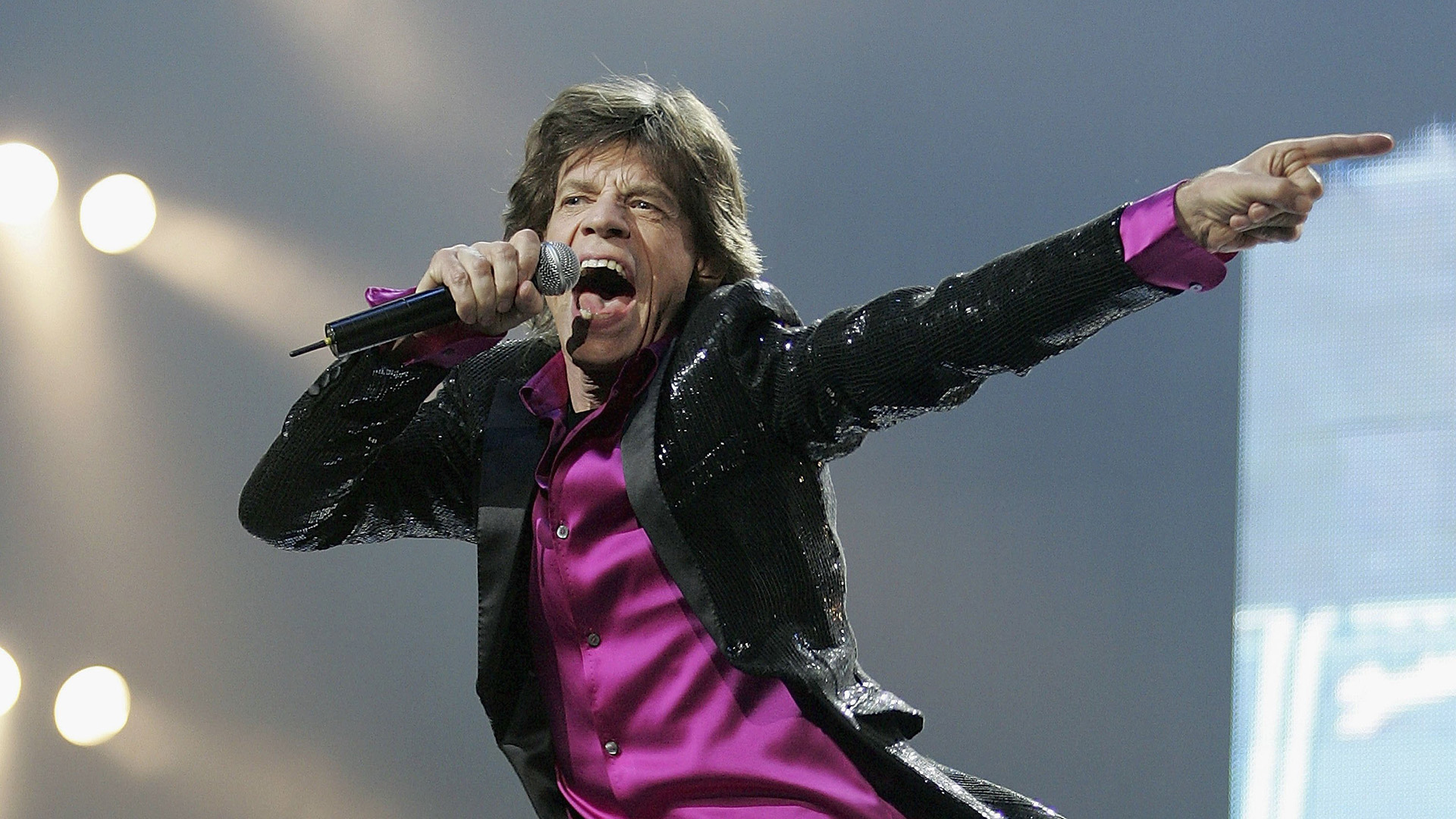 Mick Jagger of The Rolling Stones performs during a concert at Saitama Super Arena on April 2, 2006 in Saitama, Japan. The Rolling Stones are in Japan to play in 5 cities around the country as part of their Bigger Bang world tour.
