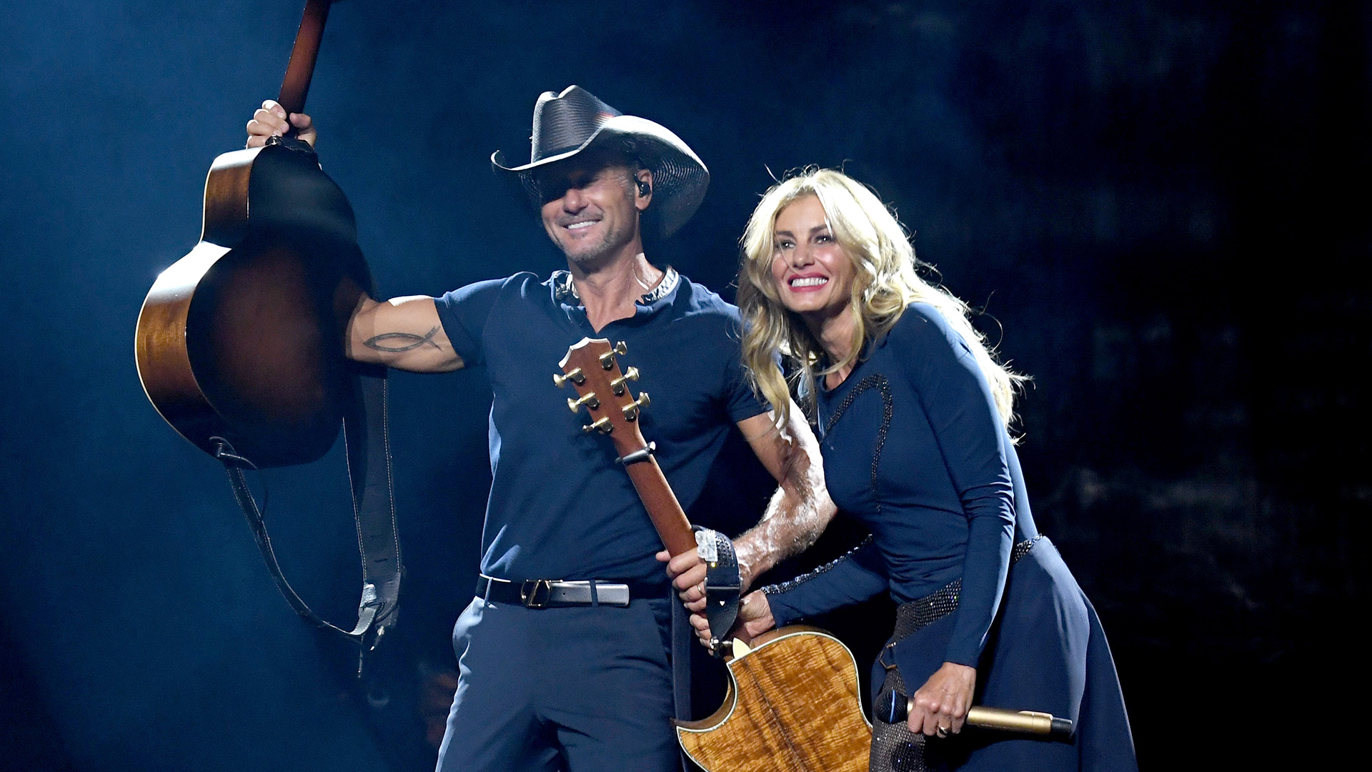 Tim McGraw (L) and Faith Hill perform onstage during the "Soul2Soul" World Tour at Staples Center on July 14, 2017 in Los Angeles, California.