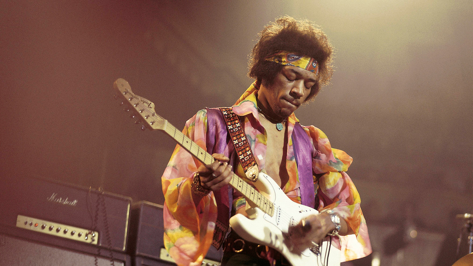 American rock guitarist and singer Jimi Hendrix (1942-1970) performs live on stage playing a white Fender Stratocaster guitar with The Jimi Hendrix Experience at the Royal Albert Hall in London on 24th February 1969