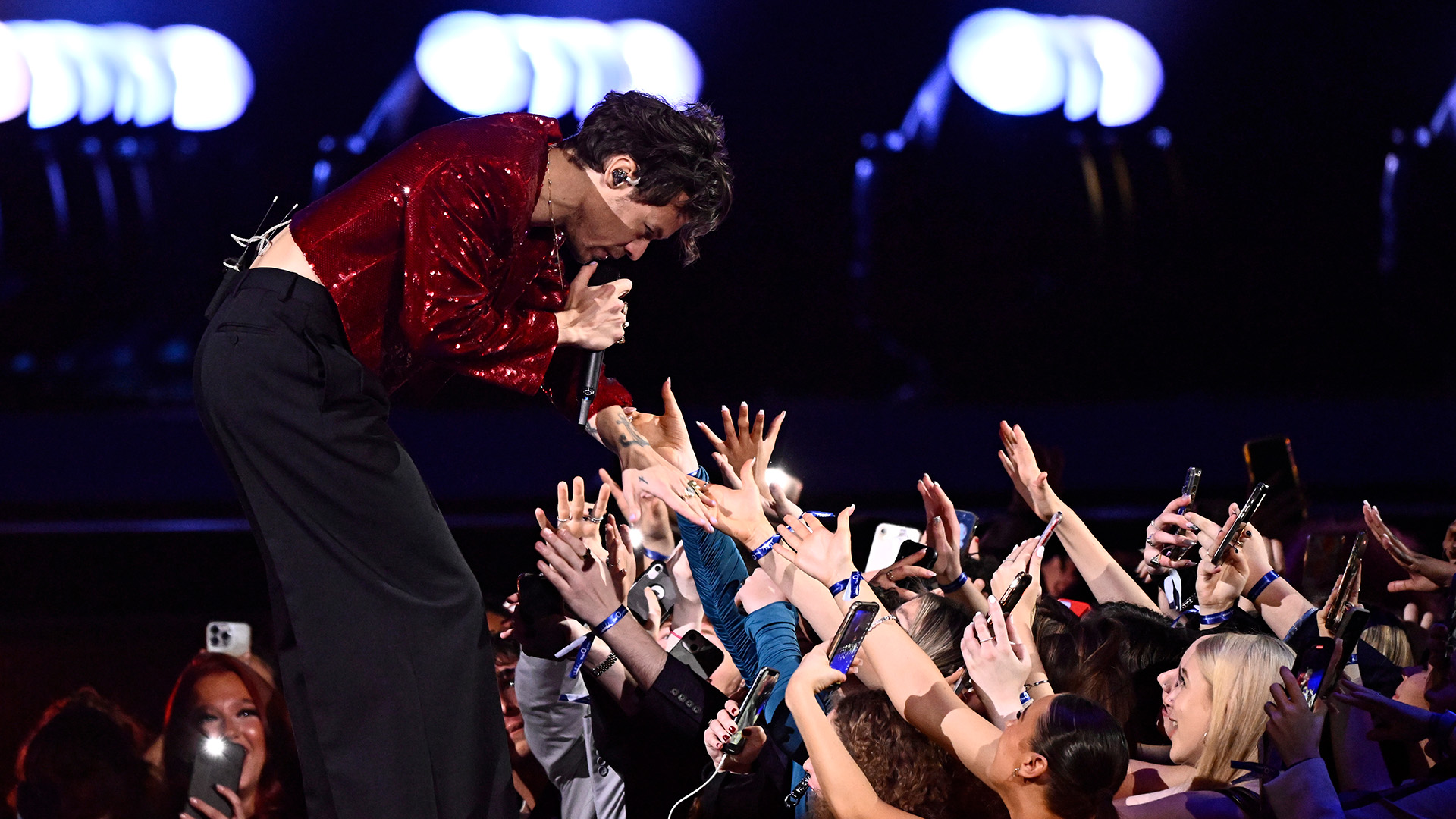 LONDON, ENGLAND - FEBRUARY 11: EDITORIAL USE ONLY Harry Styles meets fans during his performance during The BRIT Awards 2023 at The O2 Arena on February 11, 2023 in London, England. (Photo by Gareth Cattermole/Getty Images)