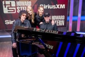 billy joel with his wife and howard stern
