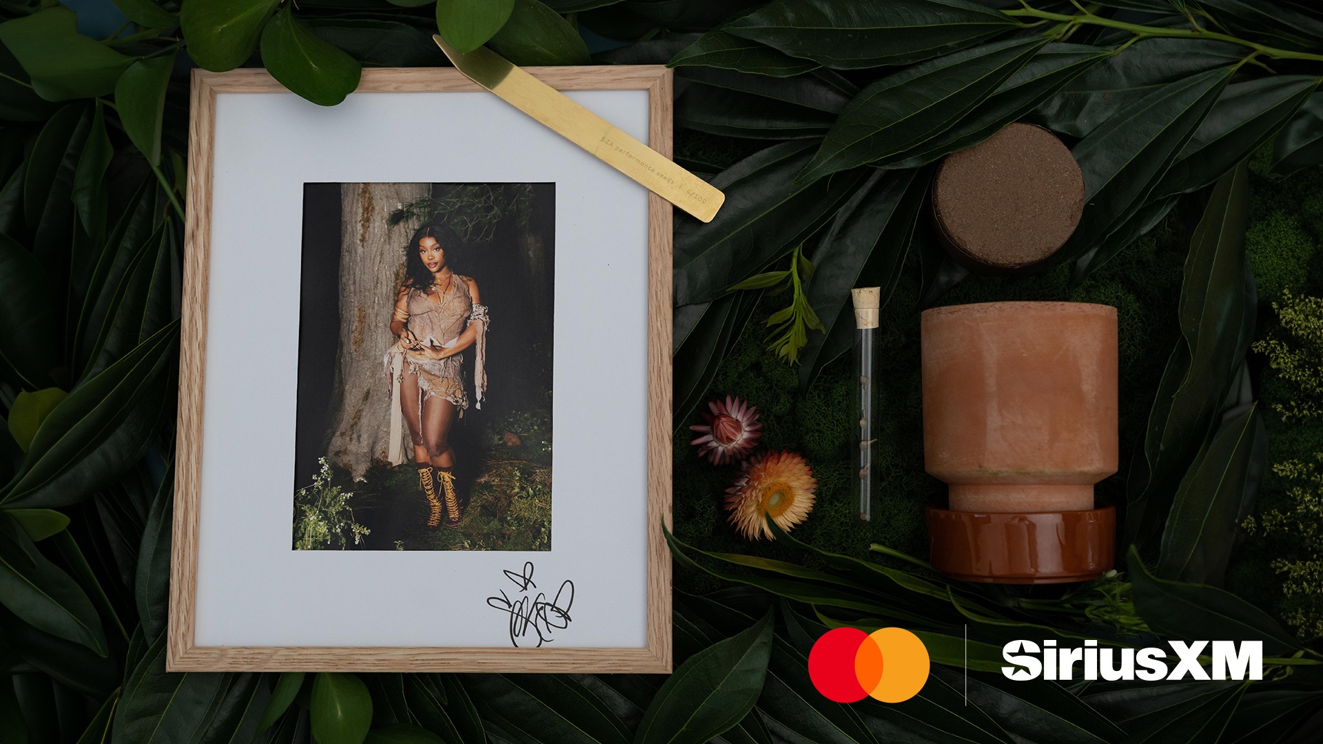 sza autographed photo from mastercard and siriusxm