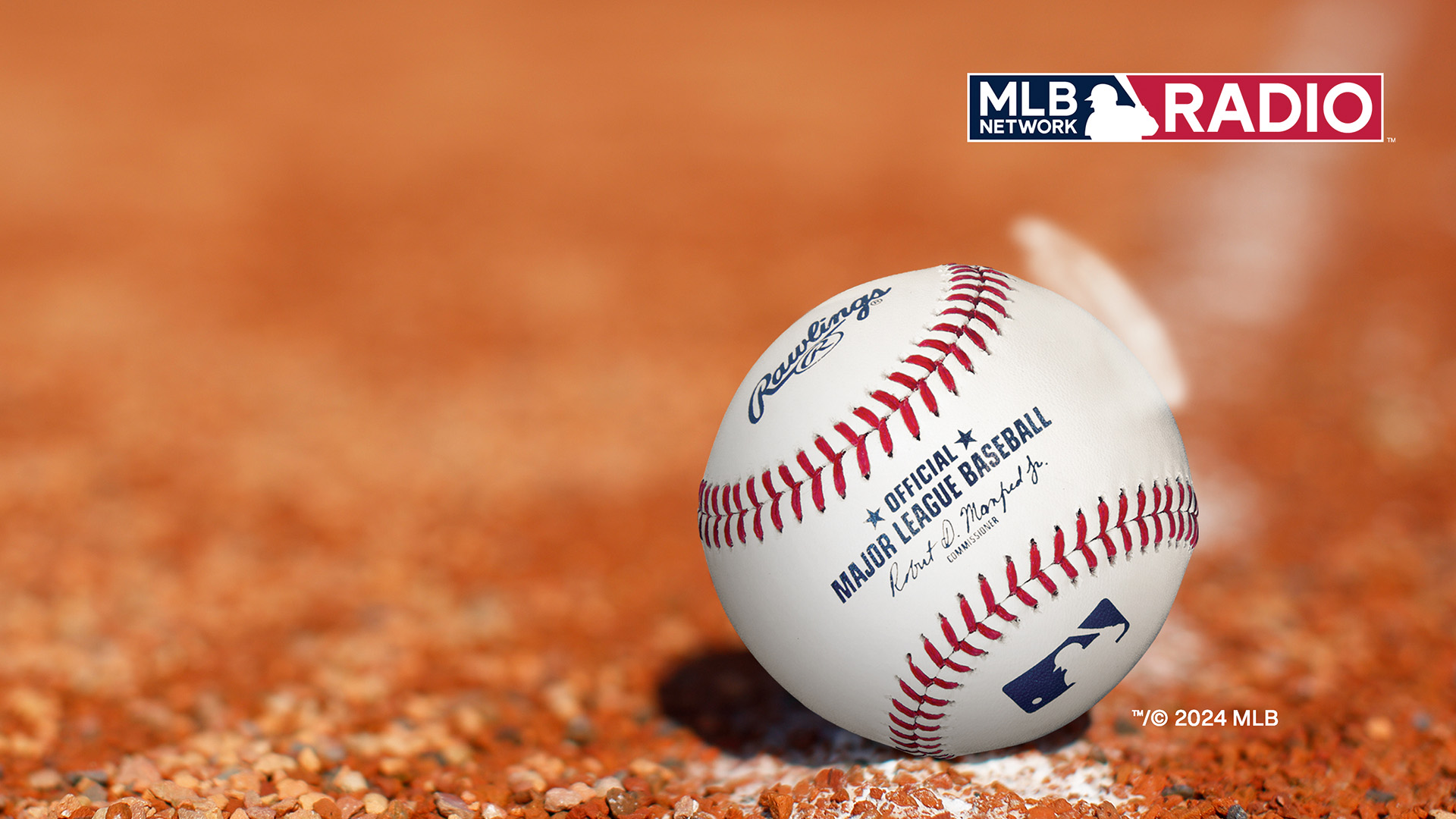 SiriusXM MLB Network Radio logo over a photo of a baseball on infield dirt copyright 2024