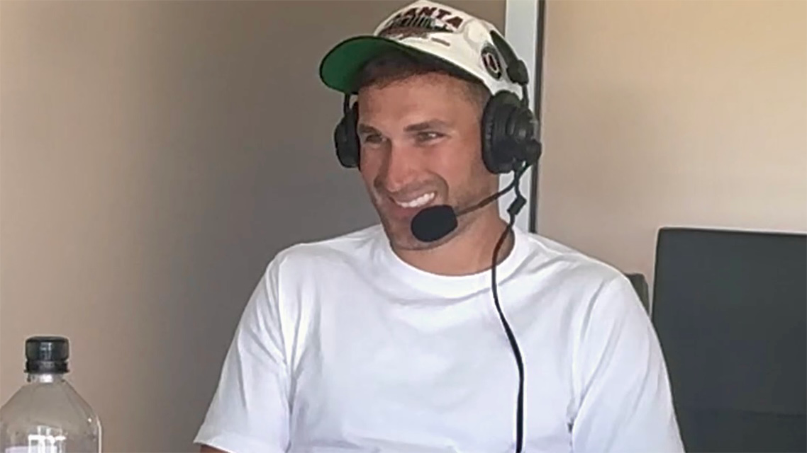 Kirk Cousins sitting down for an interview during SiriusXM NFL Radio's Training Camp Tour