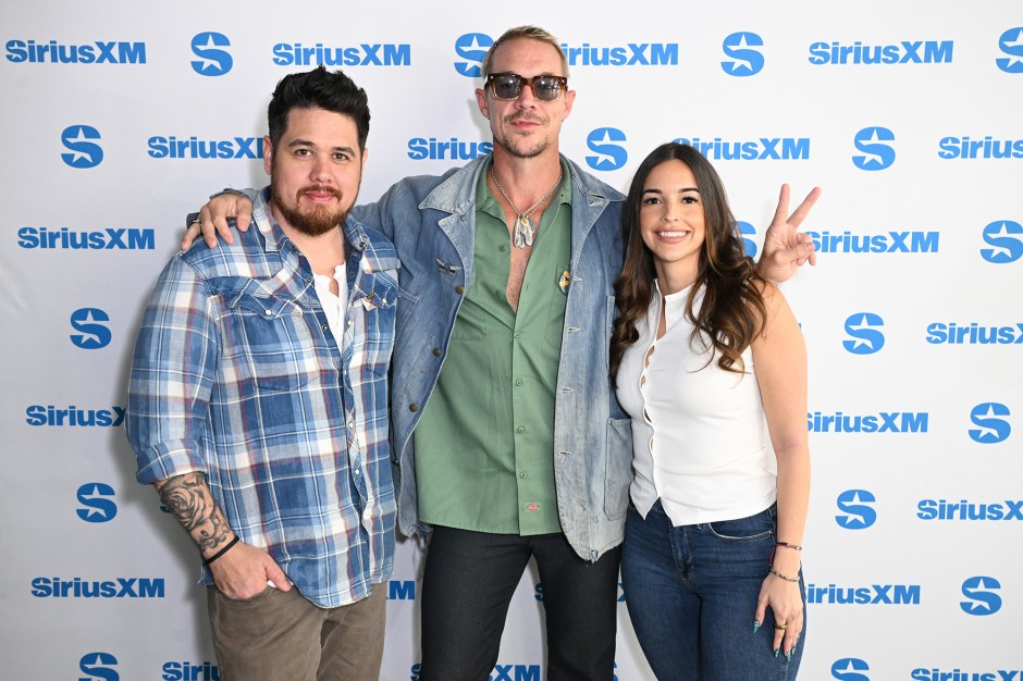 (L-R) Mack In Miami, Diplo and Jennifer Morejon pose as Diplo Visits The SiriusXM Studios In Miami at SiriusXM Studios on December 05, 2024 in Miami Beach, Florida. (Photo by Bryan Bedder/Getty Images for SiriusXM)