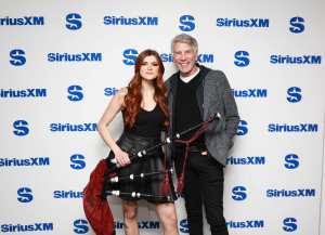 Ally the Piper with SiriusXM host Mark Goodman.