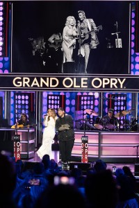 Carly Pearce and Jelly Roll performing "9 to 5" at the Grand Ole Opry's Dolly Parton Tribute.
